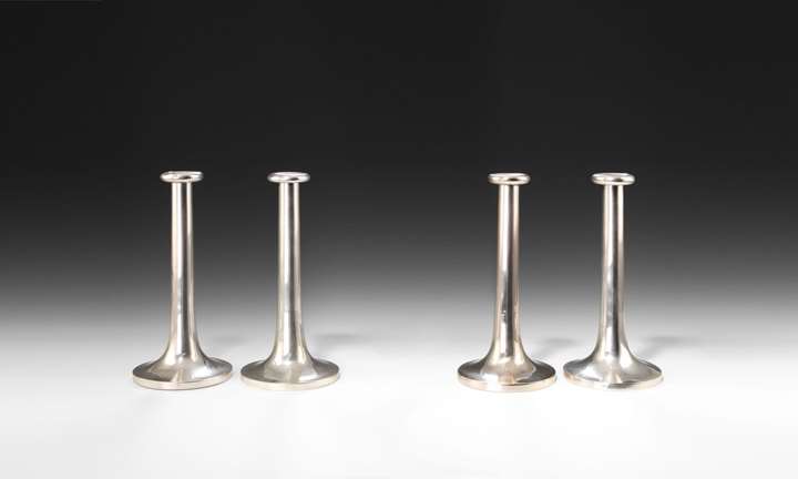 FOUR CANDLESTICKS